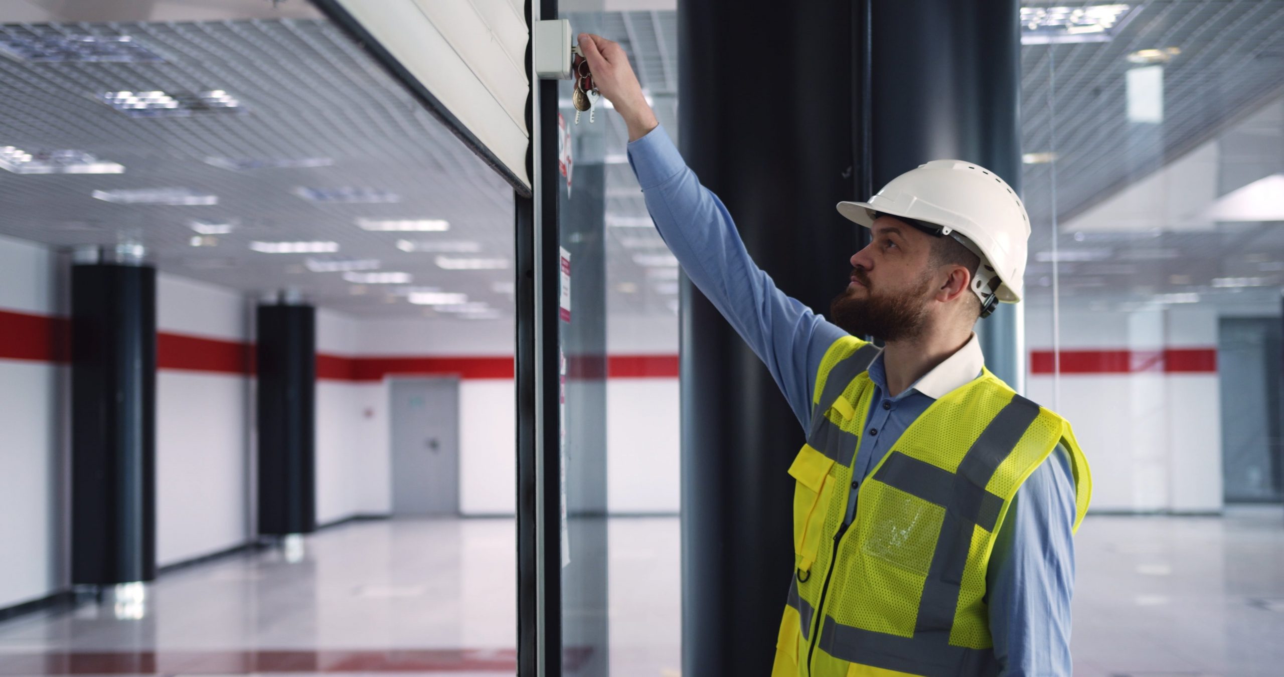 warehouse worker scanning fob to enter building